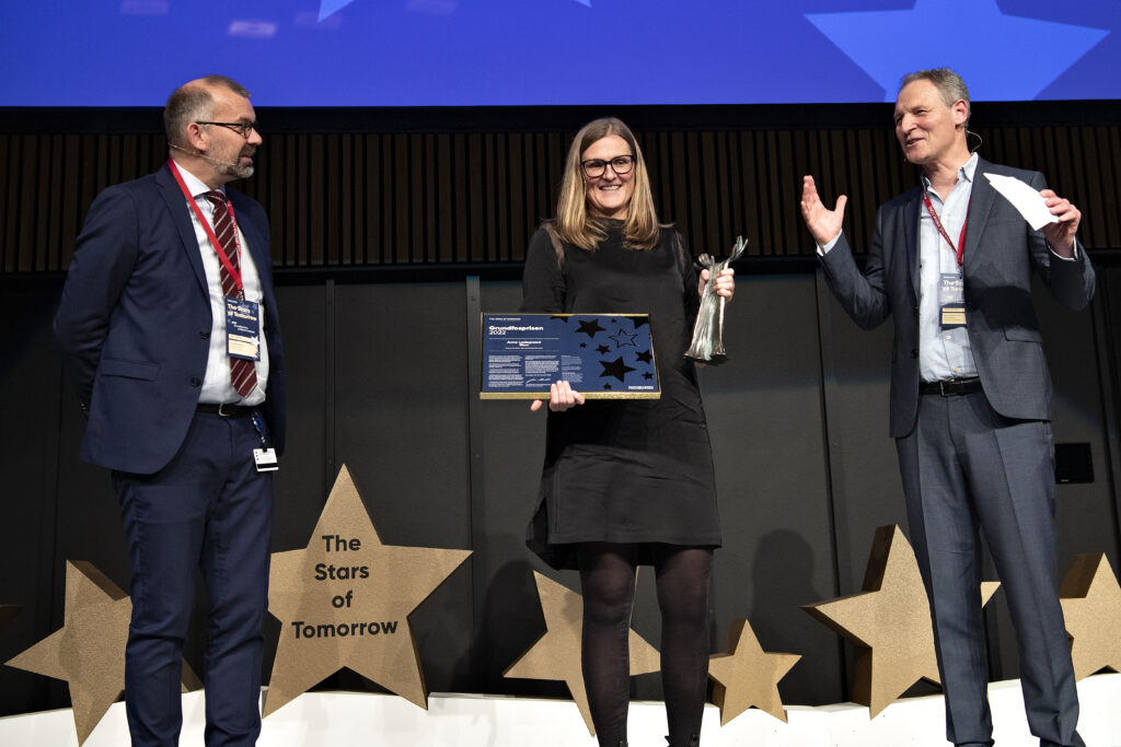 Three persons on stage. From Left: Kim Nøhr Skibsted, Anne Ladegaard Skov, and Flemming Konradsen.