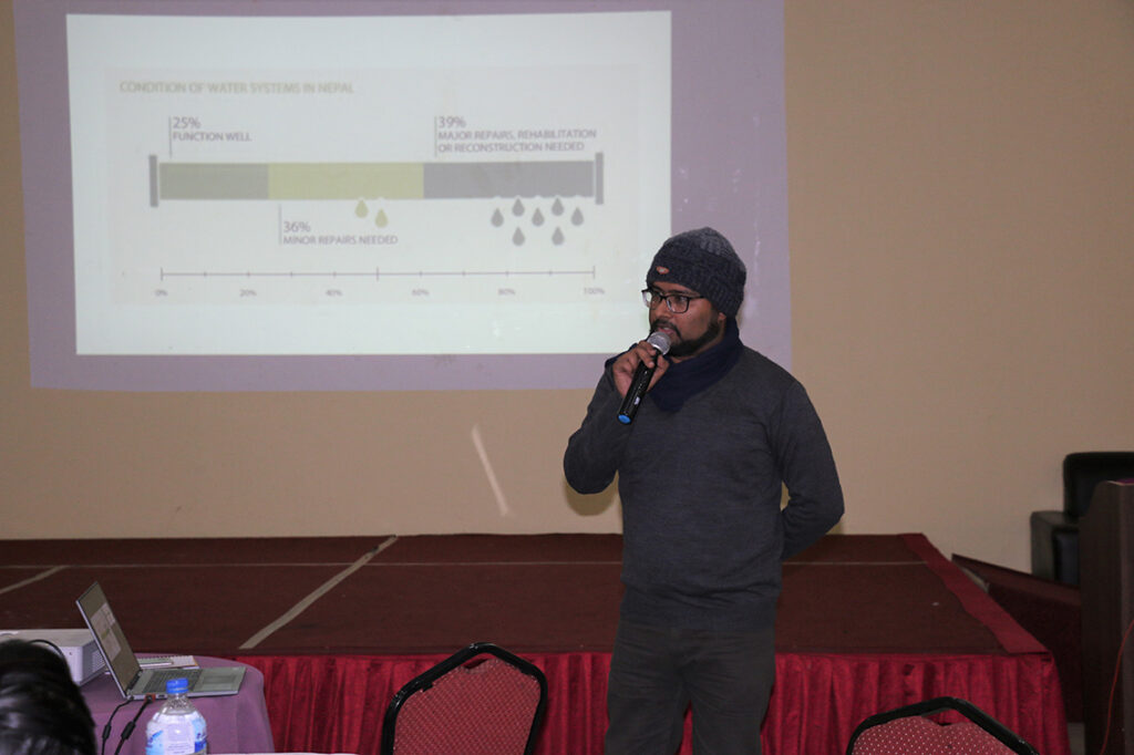 2.Anjil Adhikari presenting the model at the workshop with the Ministry of Water