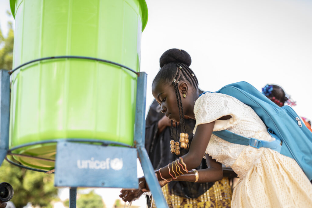 Access to handwashing ensures that Soraya can continue in school.