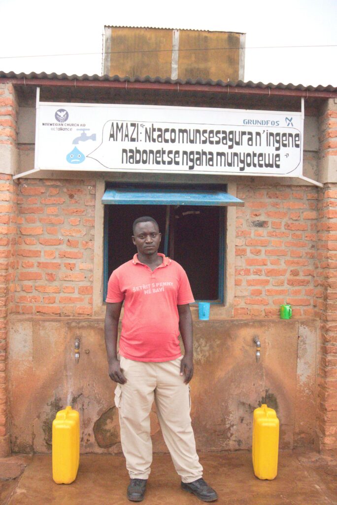 Kanyamanza Abdoulhama, water vendor at Marembo water kiosk.