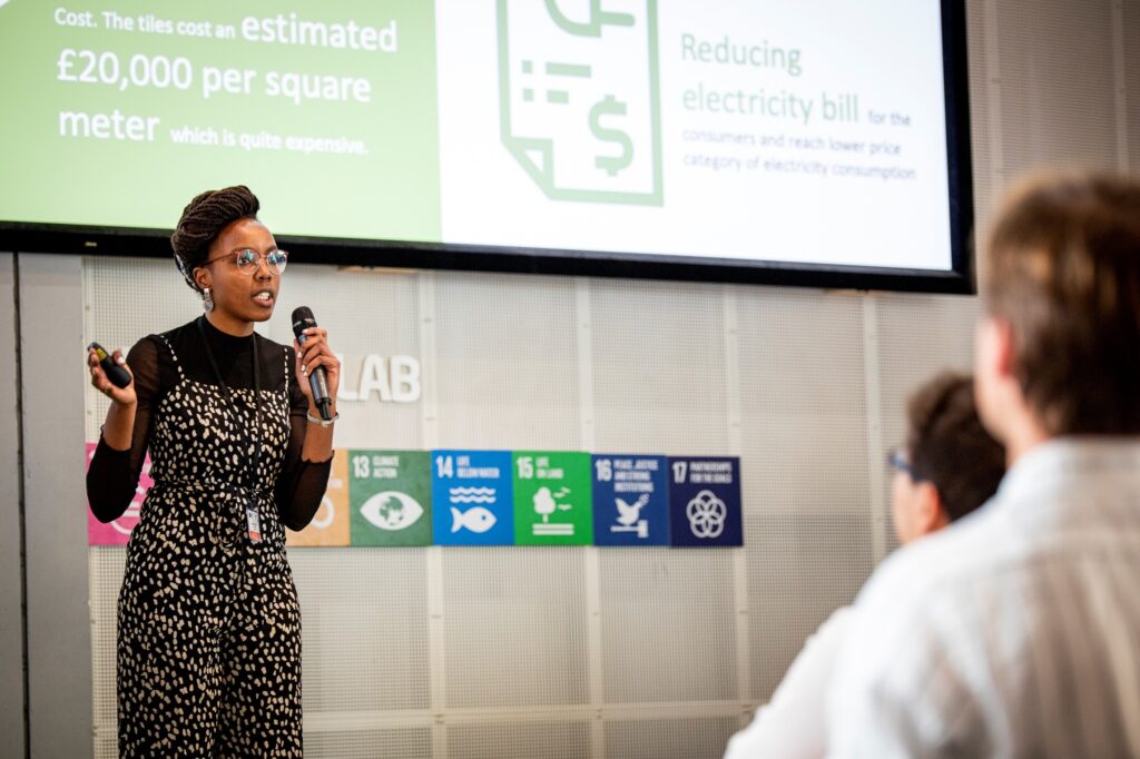 Young participant speaking at conference. Photo: DTU Skylab.