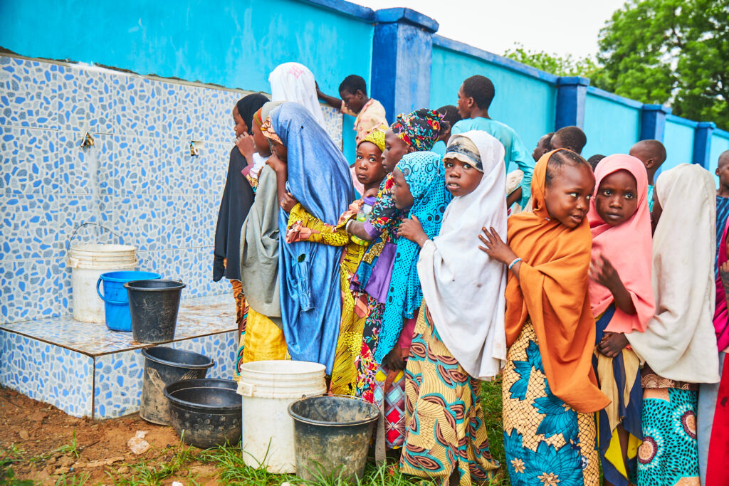 Girls standing in line to wash hands