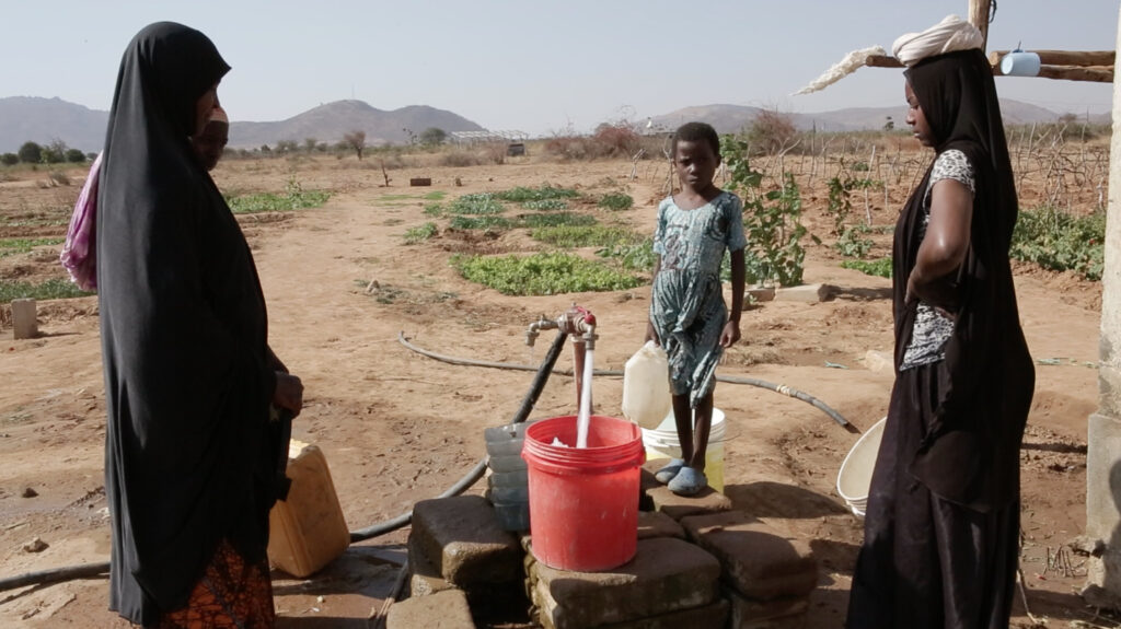 Matumbulu community women collection drinking water from the newly installed Grundfos solar driven irrigation pump.