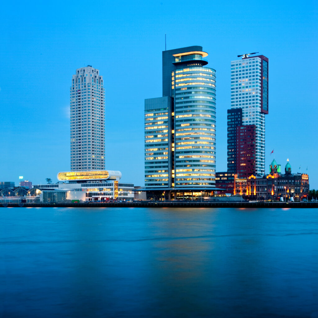 Three skyscrapers in the Rottedam Skyline, along the Muese river banks