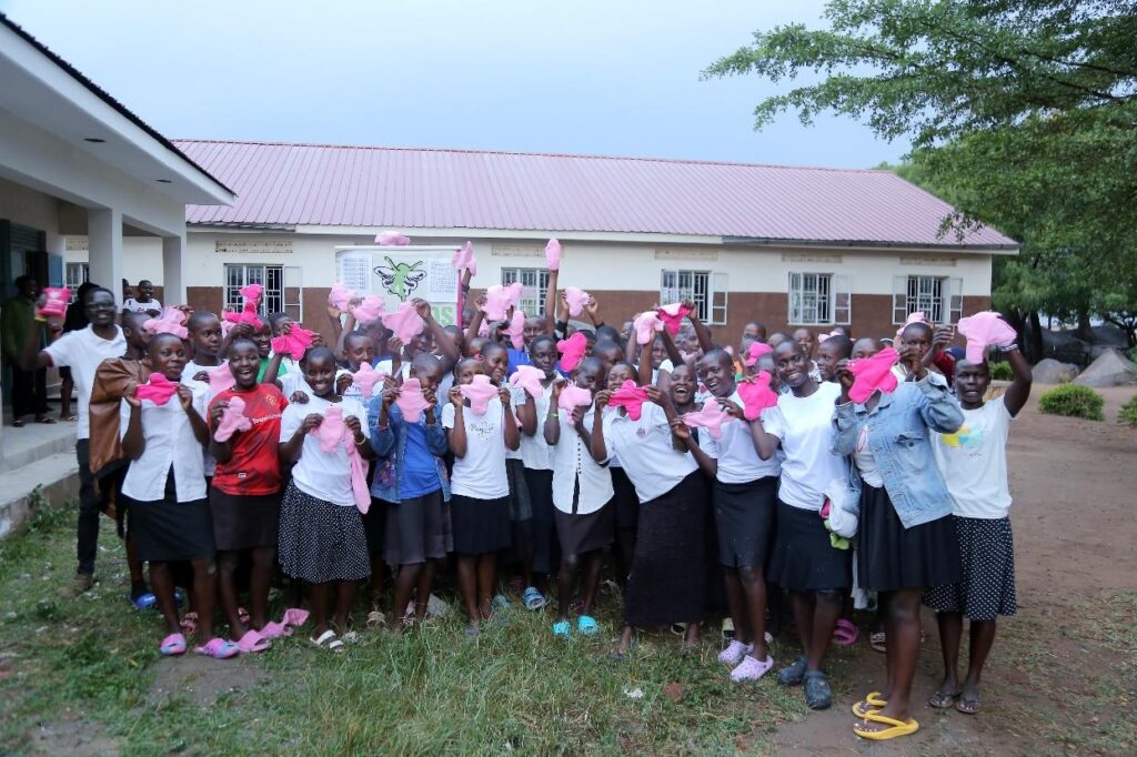 Leraners show off their hand made reusable sanitary pads.