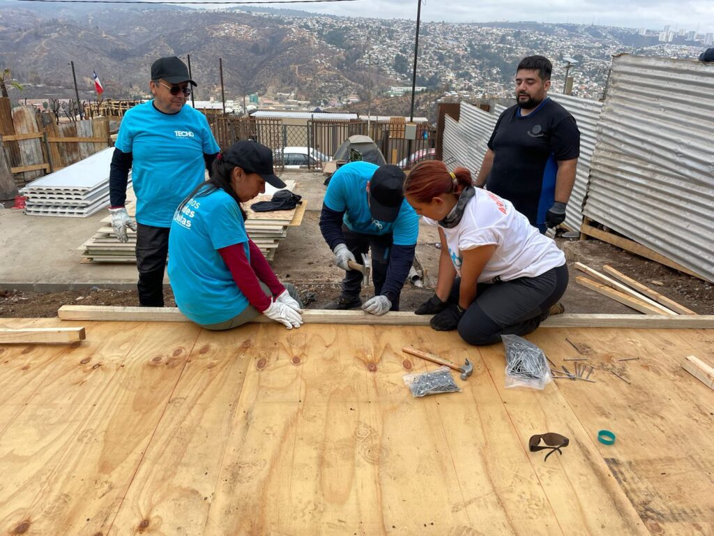 Grundfos colleagues in Chile helped build three houses for forest fire victims. Photo: Rodrigo Quiero