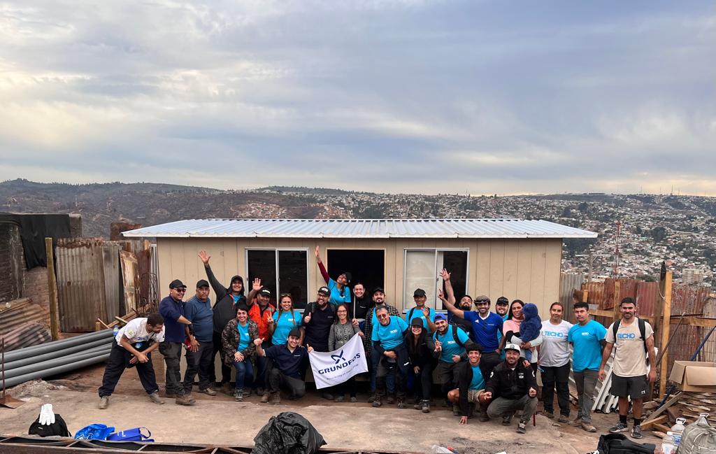 Grundfos colleagues in Chile helped build three houses for forest fire victims. Photo: Rodrigo Quiero
