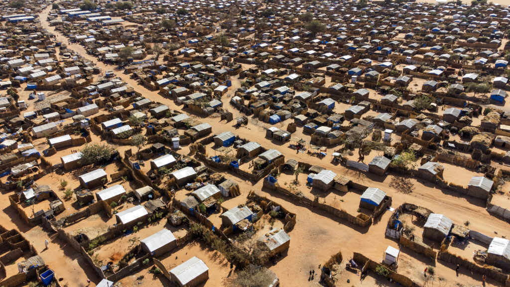 Aboutengue Refugee Settlement, located in eastern Chad near the Sudanese border, is one of several camps established to shelter individuals fleeing the conflict in Sudan ; Chad is hosting almost 1.3 million forcibly displaced people, including more than 760,000 Sudanese refugees who have fled the ongoing conflict in Sudan, since April 2023. The influx, mostly women and children, adds pressure to an already struggling country facing economic instability, conflict and extreme weather shocks. UNHCR is supporting the Government of Chad in coordinating the humanitarian response, to relocate refugees away from the border to consolidated refugee sites, and to ensure access to protection services and essential aid, such as water, shelter, food and medicine.